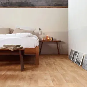 light brown flooring with wooden frame bed