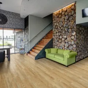 wooden stairs and green sofa