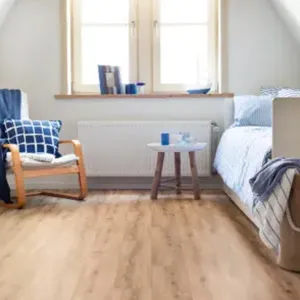 light flooring with bed and chair